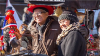 Two older individuals smiling